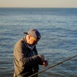 a man with a fishing rod
